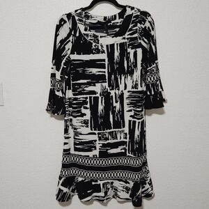 BCBGMAXAZRIA ruffle sleeve/bottom. of dress size small